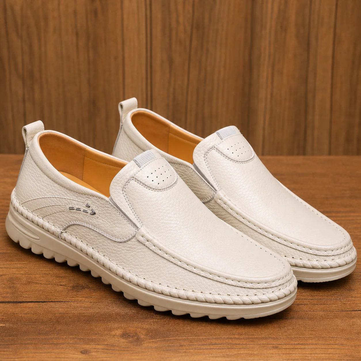 LuxeMove Soft Shoes in ivory cream on warm wood background
