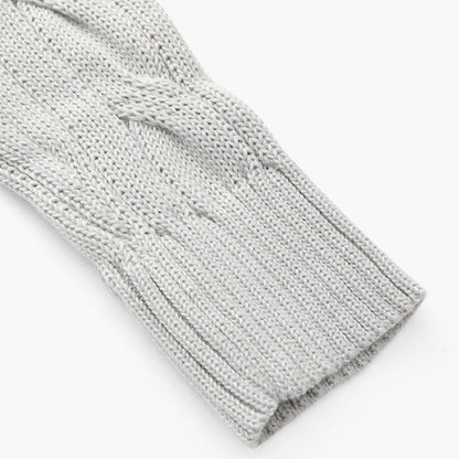 Close view of the cable knit and ribbed cuff
