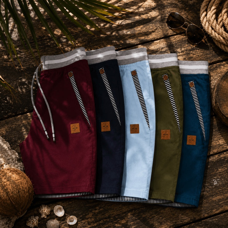 Five colours of the chino-style cotton shorts laid out together