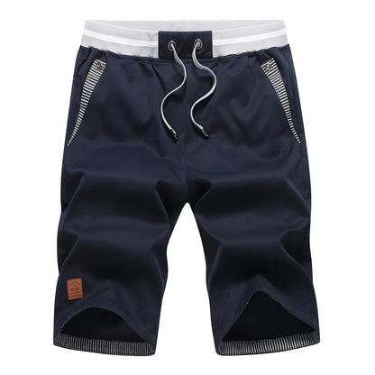 Second flat view of the navy chino-style cotton shorts with striped pocket trim
