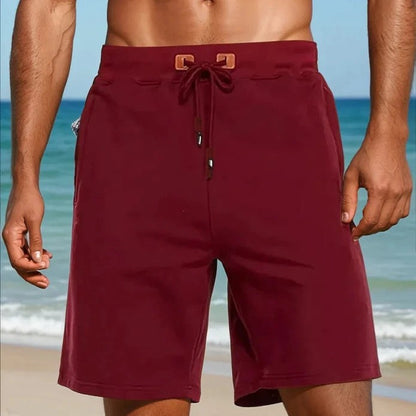 Knee-length drawstring shorts worn on a beach