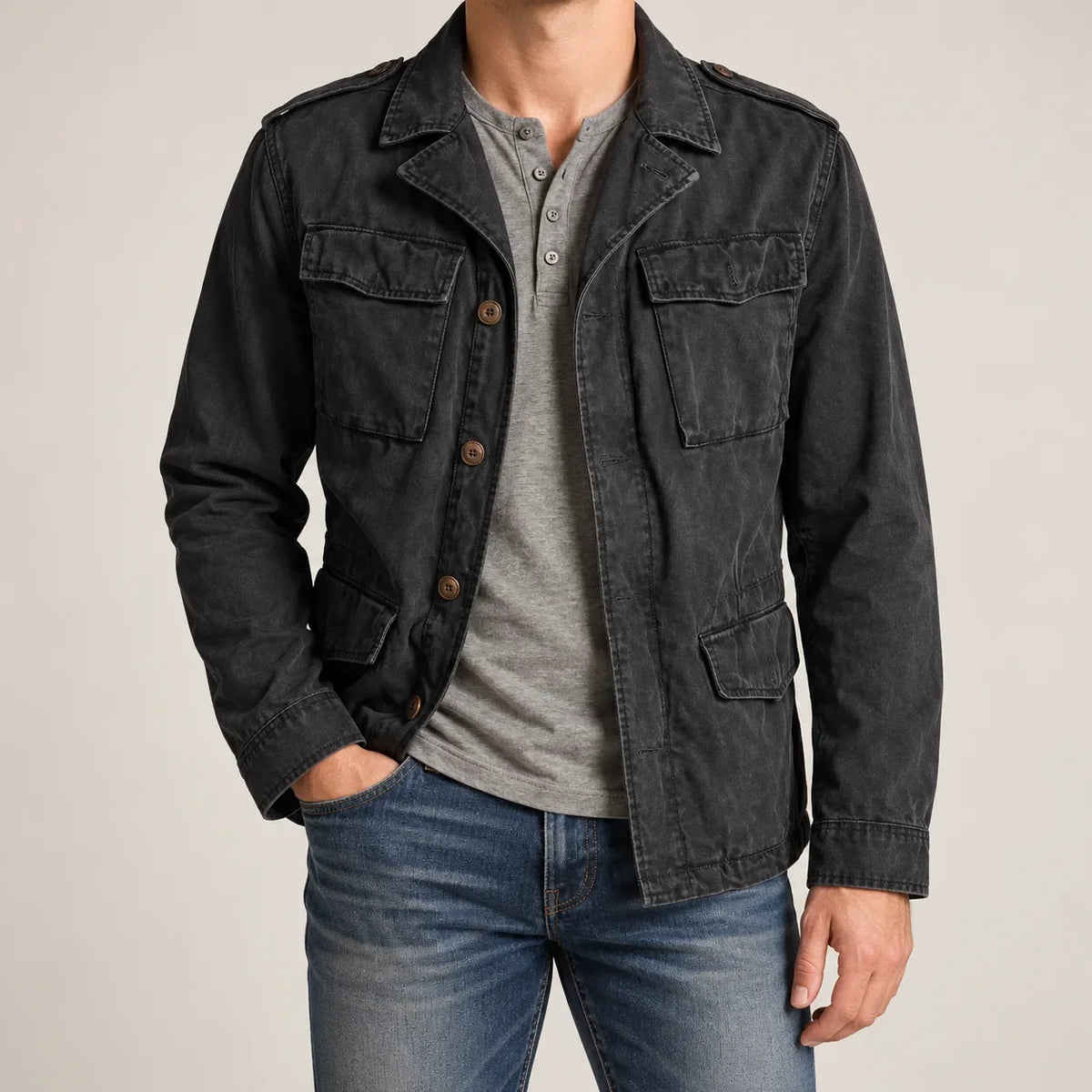 Men's black field jacket with four flap pockets, front view on model