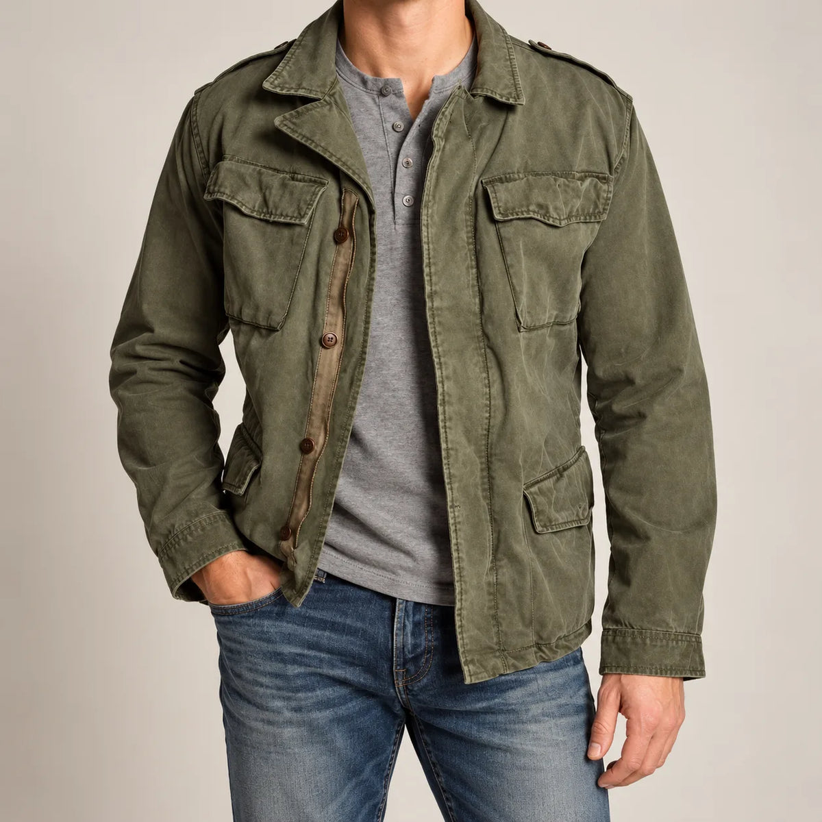 Men's green field jacket with four flap pockets, front view on model