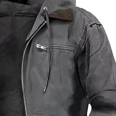 Close view of the chest zip pocket and front zip, steel shade