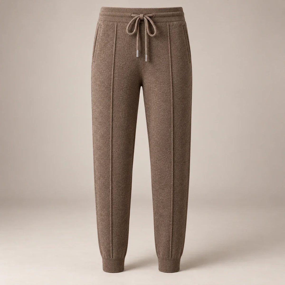 Men's brown knit drawstring joggers with ribbed cuffs, full front view