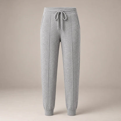 Men's light gray knit drawstring joggers with ribbed cuffs, full front view