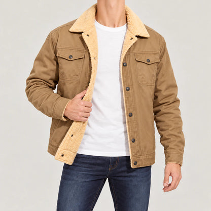 Man wearing the Khaki trucker jacket open, showing the cream pile lining, flap chest pockets and full hem