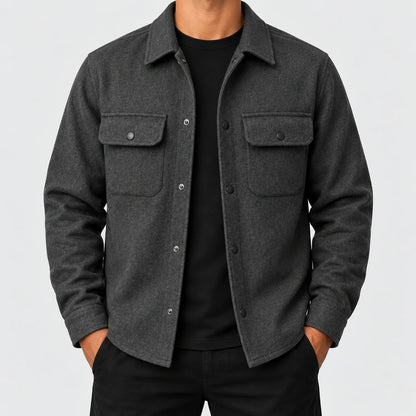 Men's snap-front utility jacket in dark gray, front view