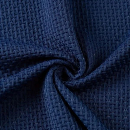 Close view of the woven waffle texture of the polo fabric