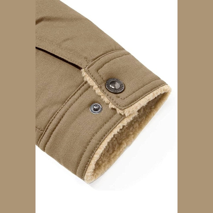 Close view of a buttoned cuff with a pile edge