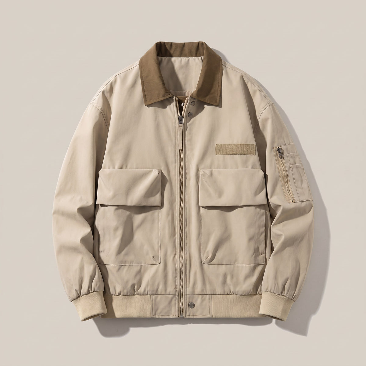 Khaki pilot jacket with a brown contrast collar, front view