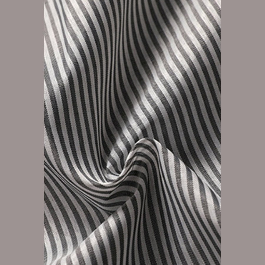 Close view of the grey and white striped lining fabric