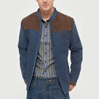 Man wearing the quilted jacket buttoned and unbuttoned over a striped shirt