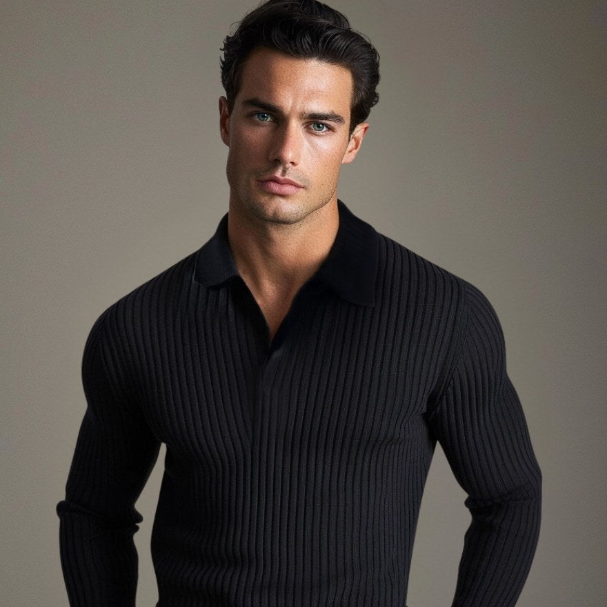 Man wearing the black ribbed polo with a relaxed open collar