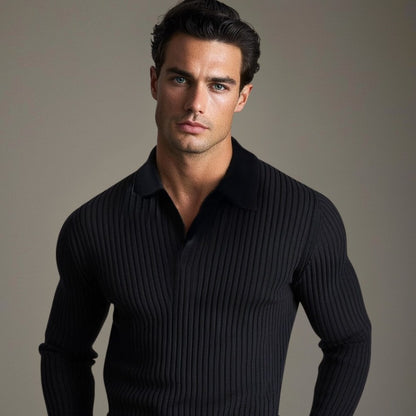 Man wearing the black ribbed polo with a relaxed open collar