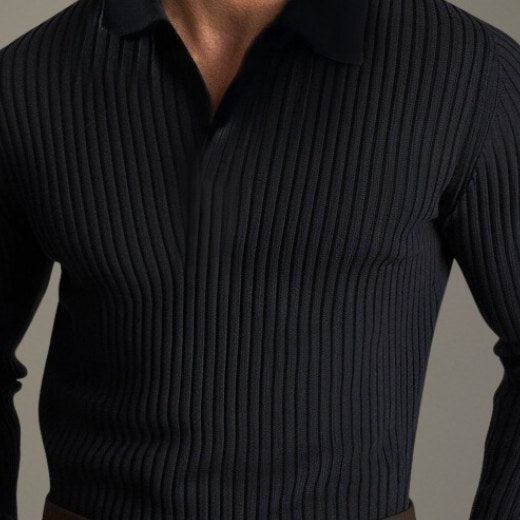 Close view of the vertical ribbing and placket on the black polo