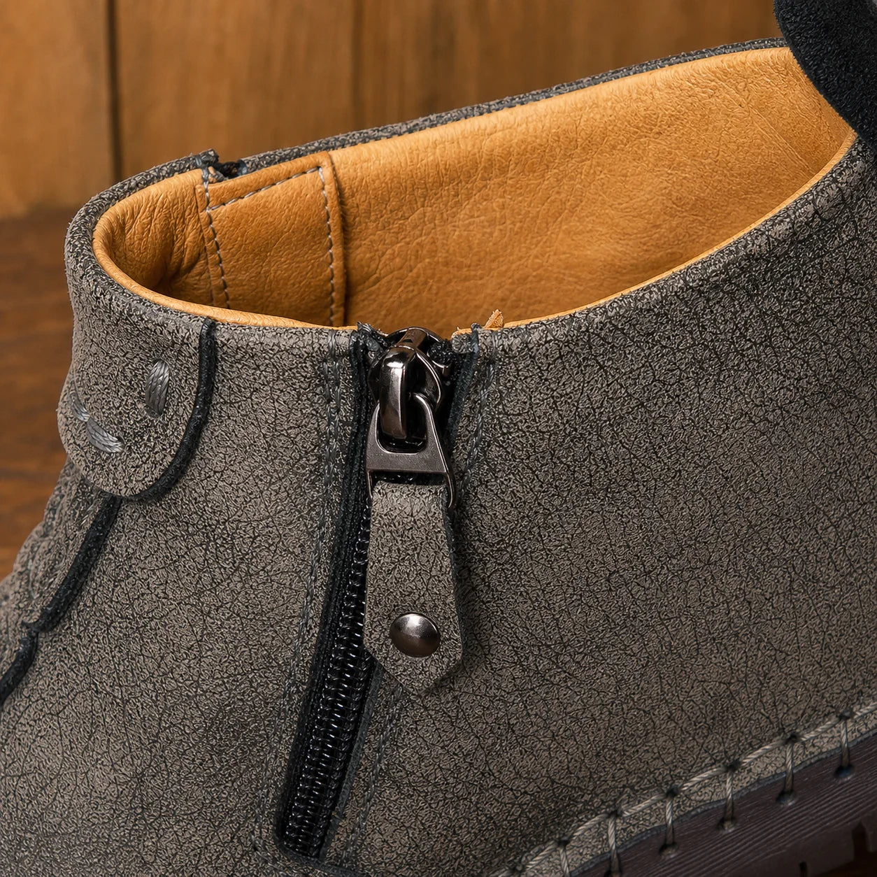 Close-up of Stitch Leather Boots side zipper stitching and lining