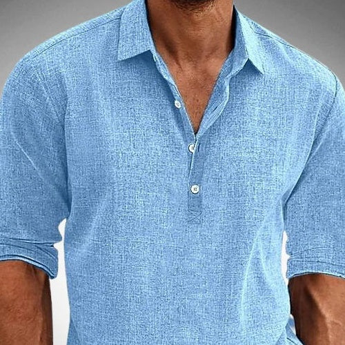 Close view of the collar and three-button placket on the blue henley