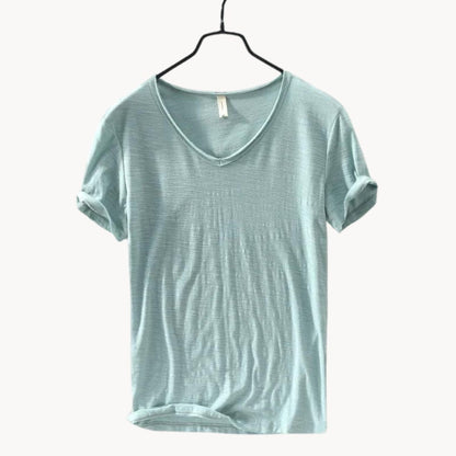 Sage green men's V-neck t-shirt with rolled sleeves, front view