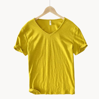 Mustard yellow men's V-neck t-shirt with rolled sleeves, front view