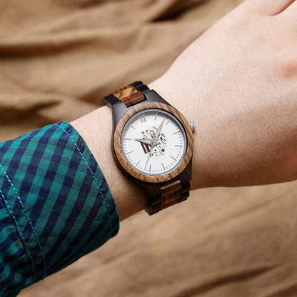 Whitmore wooden watch on a wrist with a checked sleeve