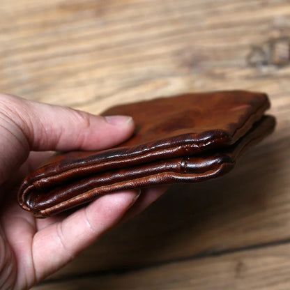 Zachary wallet held on its side showing the fold
