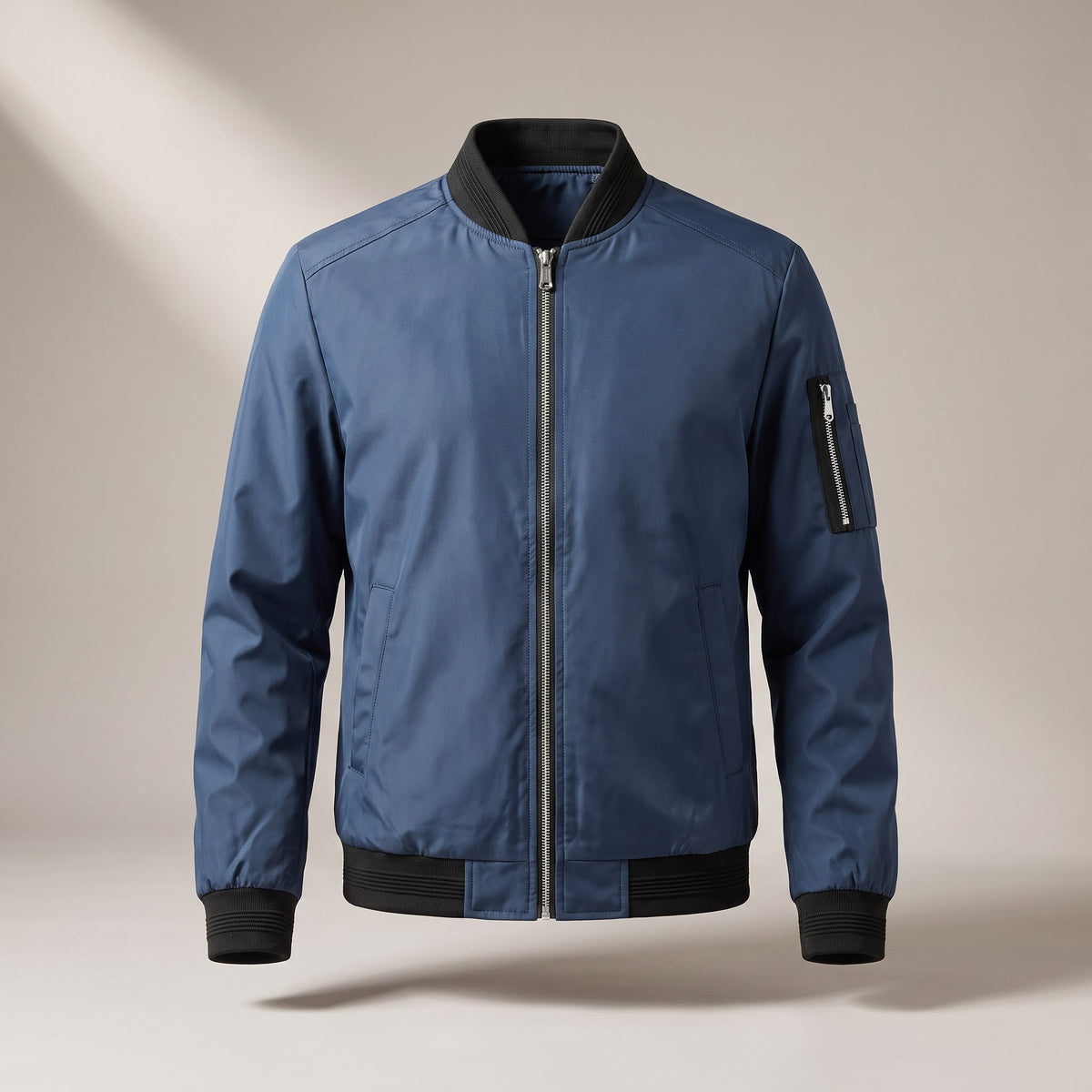 Blue bomber jacket with a sleeve pocket, front view