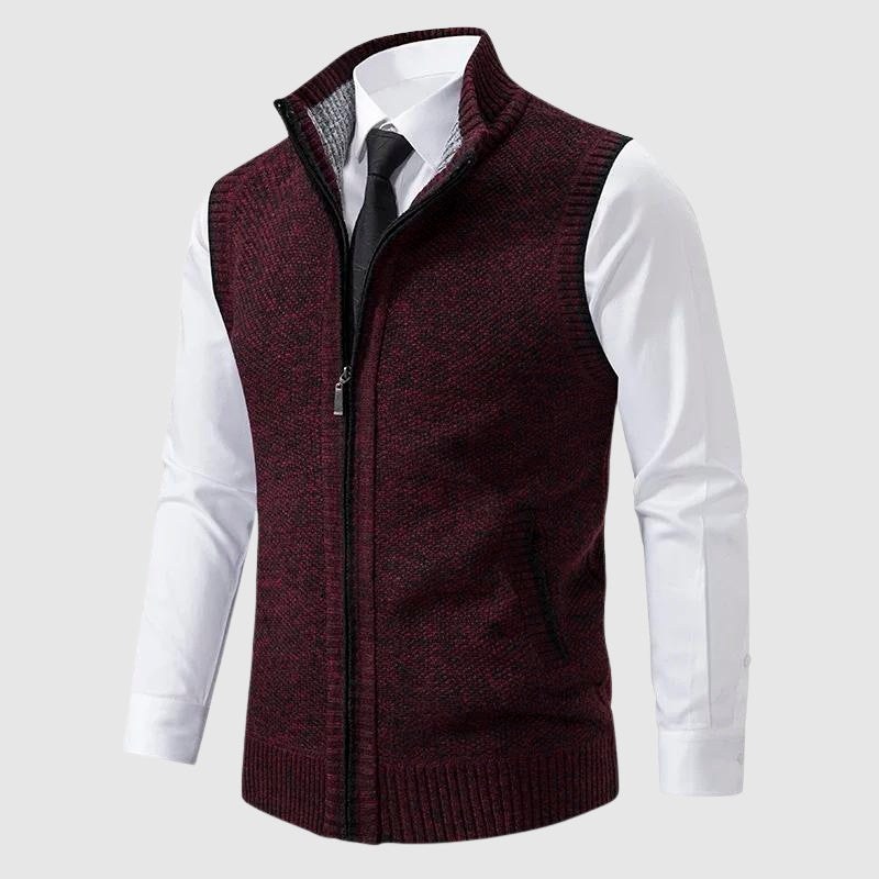 Red speckled zip-up knit vest worn over a white shirt and tie